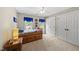 Cozy bedroom features a wooden bed with built-in drawers and natural light at 408 Evert Dr, Cary, NC 27511