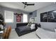 Modern bedroom with a low-profile bed, Penn State decor, and cozy beanbag chair at 4101 John S Raboteau Wynd, Raleigh, NC 27612
