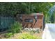 Brick entrance sign for Olde Raleigh community with decorative lanterns and landscaping at 4101 John S Raboteau Wynd, Raleigh, NC 27612