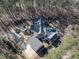Estate aerial view showcasing circular driveway, large lawn, pool, guest house, and expansive landscaping and mature trees at 464 Rosemont Dr, Durham, NC 27713