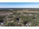 Panoramic aerial view showing vast forest, distant city, with a single property nestled among the trees at 464 Rosemont Dr, Durham, NC 27713