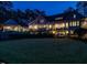 Large grassy backyard with the home in the background with a pool and another outbuilding at 464 Rosemont Dr, Durham, NC 27713