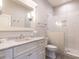 Elegant bathroom featuring white cabinets, marble countertop, and glass-enclosed shower at 464 Rosemont Dr, Durham, NC 27713