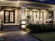 Charming front porch featuring a swing, rocking chairs, and double-door entry at 464 Rosemont Dr, Durham, NC 27713