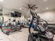 Home gym equipped with modern exercise machines, mirrored walls, and ample space for a complete workout at 464 Rosemont Dr, Durham, NC 27713