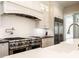 Well-equipped kitchen featuring stainless steel appliances and a pot filler faucet at 464 Rosemont Dr, Durham, NC 27713