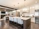 Open kitchen layout with large island and hardwood floors, perfect for entertaining at 464 Rosemont Dr, Durham, NC 27713
