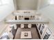 Unique view of a living room with white beams and fireplace, highlighting architectural details at 464 Rosemont Dr, Durham, NC 27713