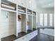 Well-organized mudroom with custom built-ins, bench seating, and ample storage at 464 Rosemont Dr, Durham, NC 27713