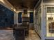 Outdoor dining area with a grill, kitchen, and eating area near the windows at 464 Rosemont Dr, Durham, NC 27713
