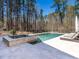 Backyard swimming pool and spa area with lounge chairs for relaxation and enjoyment of the outdoors at 464 Rosemont Dr, Durham, NC 27713