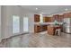 Kitchen boasts stainless steel appliances, granite countertops, and natural light at 504 Applecross Dr, Mebane, NC 27302