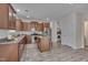 Well-lit kitchen features stainless steel appliances and stylish finishes at 504 Applecross Dr, Mebane, NC 27302