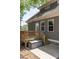 Exterior view of a home with a small wood deck and patio area at 507 Canal St, Durham, NC 27701
