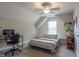 Comfortable bedroom features natural light, plush carpeting, and space for a desk and bed at 507 Canal St, Durham, NC 27701