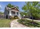 Inviting home with a stone walkway, lush lawn, and attractive landscaping at 507 Canal St, Durham, NC 27701