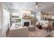 Bright living room featuring a fireplace, built-in shelves, and stylish furnishings at 507 Canal St, Durham, NC 27701