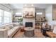 Stylish living room with a cozy fireplace, ample seating, and chic decor at 507 Canal St, Durham, NC 27701