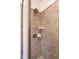 Walk-in shower featuring tiled walls and modern shower head at 507 Canal St, Durham, NC 27701