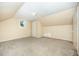 This bedroom has neutral carpet and an interesting ceiling line at 510 May St, Gibsonville, NC 27249