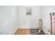 This laundry room has wood and vinyl floors and a window at 510 May St, Gibsonville, NC 27249
