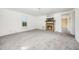 Inviting living room with a brick fireplace and cozy carpeting at 510 May St, Gibsonville, NC 27249