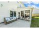 A patio and screened-in porch offer outdoor living spaces at 5172 Copain Cove, Fuquay Varina, NC 27526