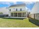Rear exterior view showing screened in porch at 5172 Copain Cove, Fuquay Varina, NC 27526