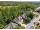 Aerial view of a neighborhood featuring mature trees, and well-maintained homes at 5240 Holly Ridge Farm Rd, Raleigh, NC 27616