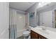 A full bathroom featuring tiled shower and tub, with modern vanity and great mirror at 5240 Holly Ridge Farm Rd, Raleigh, NC 27616