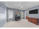 Spacious bedroom featuring neutral carpet, soothing paint color, and an ensuite bath at 5240 Holly Ridge Farm Rd, Raleigh, NC 27616