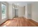 Welcoming entryway with hardwood floors, natural light, and access to the main living areas at 5610 Picnic Rock Ln, Raleigh, NC 27613