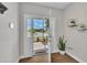 Bright and inviting foyer with wood floors, opening to a view of the front yard at 5701 Princess Curry Way, Raleigh, NC 27610