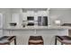 Stylish kitchen with stainless steel appliances, granite counters, and bar stool seating at 5701 Princess Curry Way, Raleigh, NC 27610