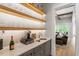 Chic bar area with floating shelves, modern fixtures, and stylish design elements at 5803 Vintage Oak Ln, Raleigh, NC 27613