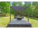 Outdoor firepit area with seating perfect for entertaining or relaxing under the stars at 5803 Vintage Oak Ln, Raleigh, NC 27613