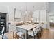 Gourmet kitchen with stainless steel appliances, a large island, and custom cabinetry at 5803 Vintage Oak Ln, Raleigh, NC 27613