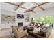 Elegant living room with coffered ceilings, fireplace, and comfortable seating at 5803 Vintage Oak Ln, Raleigh, NC 27613