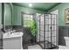 Bathroom featuring a glass enclosed shower, unique accents and natural light at 615 Beaver Creek Rd, Apex, NC 27502