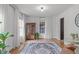 Cozy living room featuring hardwood floors, natural light and neutral paint at 615 Beaver Creek Rd, Apex, NC 27502