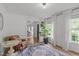 Inviting living room boasts hardwood floors, natural light, and stylish furniture at 615 Beaver Creek Rd, Apex, NC 27502