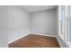 Well lit room with hardwood floors and double hung windows at 6185 Nc-50, Benson, NC 27504