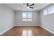 Bright bedroom featuring hardwood floors and a large window with beautiful lake views at 6185 Nc-50, Benson, NC 27504