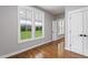 Bright room with hardwood floors and large double hung windows overlooking the property at 6185 Nc-50, Benson, NC 27504