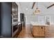 Kitchen showcasing custom cabinets, stainless steel appliances, and large island at 6185 Nc-50, Benson, NC 27504
