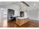 Spacious kitchen with light countertops, stainless appliances, and decorative lighting at 6185 Nc-50, Benson, NC 27504