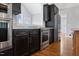 Dark stained cabinets with stainless appliances, a custom island and light counter tops at 6185 Nc-50, Benson, NC 27504