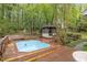 Backyard boasts a pool, deck, gazebo, and mature landscaping at 6245 Hampton Ridge Rd, Raleigh, NC 27603