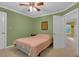 Cozy bedroom featuring a neutral color scheme and ample natural light at 6245 Hampton Ridge Rd, Raleigh, NC 27603