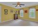 Spacious bedroom featuring a yellow color scheme and ample natural light at 6245 Hampton Ridge Rd, Raleigh, NC 27603